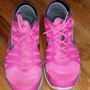 Pink nike sneakers! Worn- in good condition